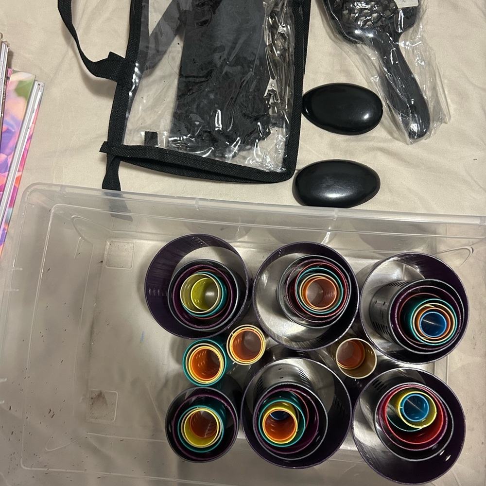 Set of hair styling tools, including brushes, combs, and 75pcs rollers
